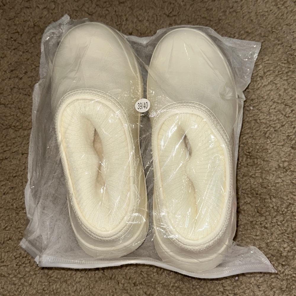 White shoes with ankle cushion. New, never worn. Size 9.